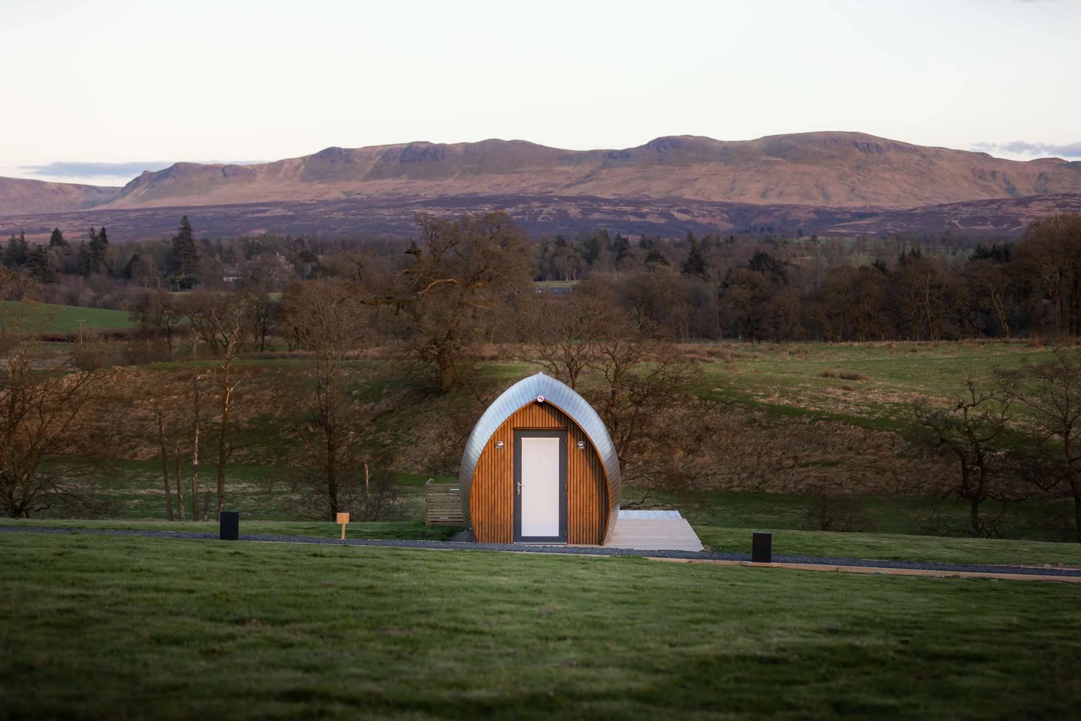 front view of Endrick Escape Glamping pod with hills in the background